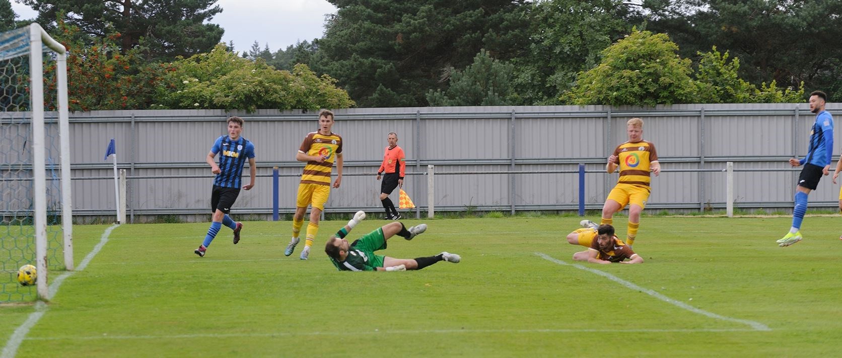 Dylan Lawrence (right) scores the Jags only goal in the heavy defeat to Forres Mechanics. Picture: Stewart Grant.