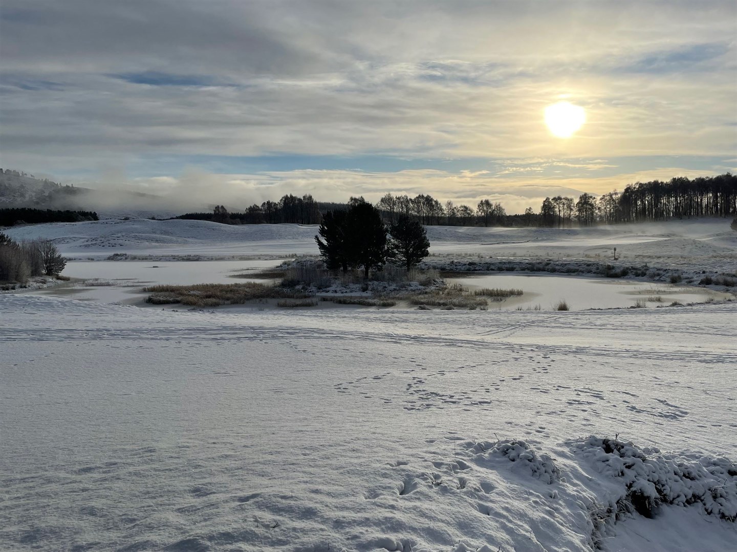 A wintry scene at the Macdonald Spey Valley Golf Course by the River Spey in Aviemore.
