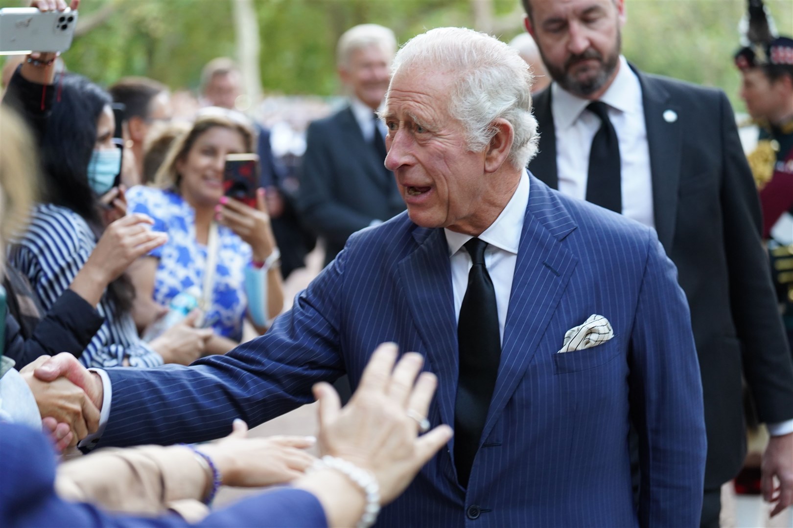 King Charles III greets members of the public outside Clarence House (James Manning/PA)