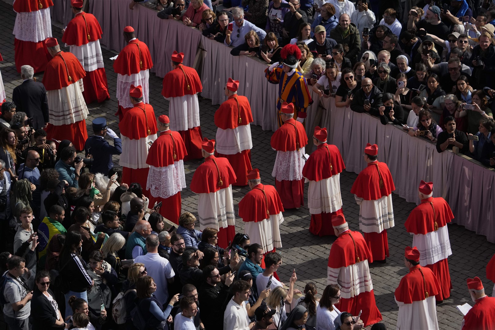 Cardinals take part in the ceremony transferring Pope Francis’s body, which will lie in state at St Peter’s Basilica for three days, at the Vatican (Gregorio Borgia/AP)