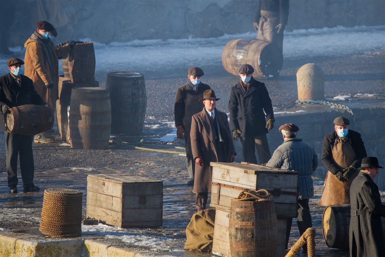 Extras wear masks during takes due to the ongoing Covid-19 pandemic. Picture: Daniel Forsyth