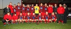 United manager Jock Mackay (third from right) with his winning team and club officials. Photo: www.jamesgunn.co.uk