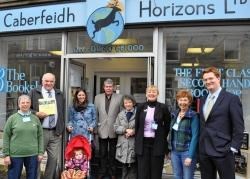 Stuart Black (second left) Gregfor Rimell (centre) and Danny Alexander (right) at the bookshop