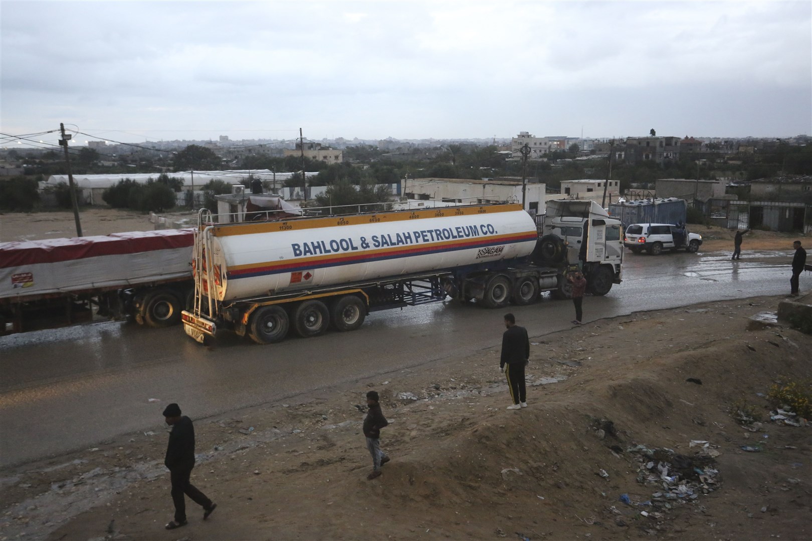 Humanitarian aid trucks arrive in Rafah on the Gaza -Egypt border (Hatem Ali/AP)