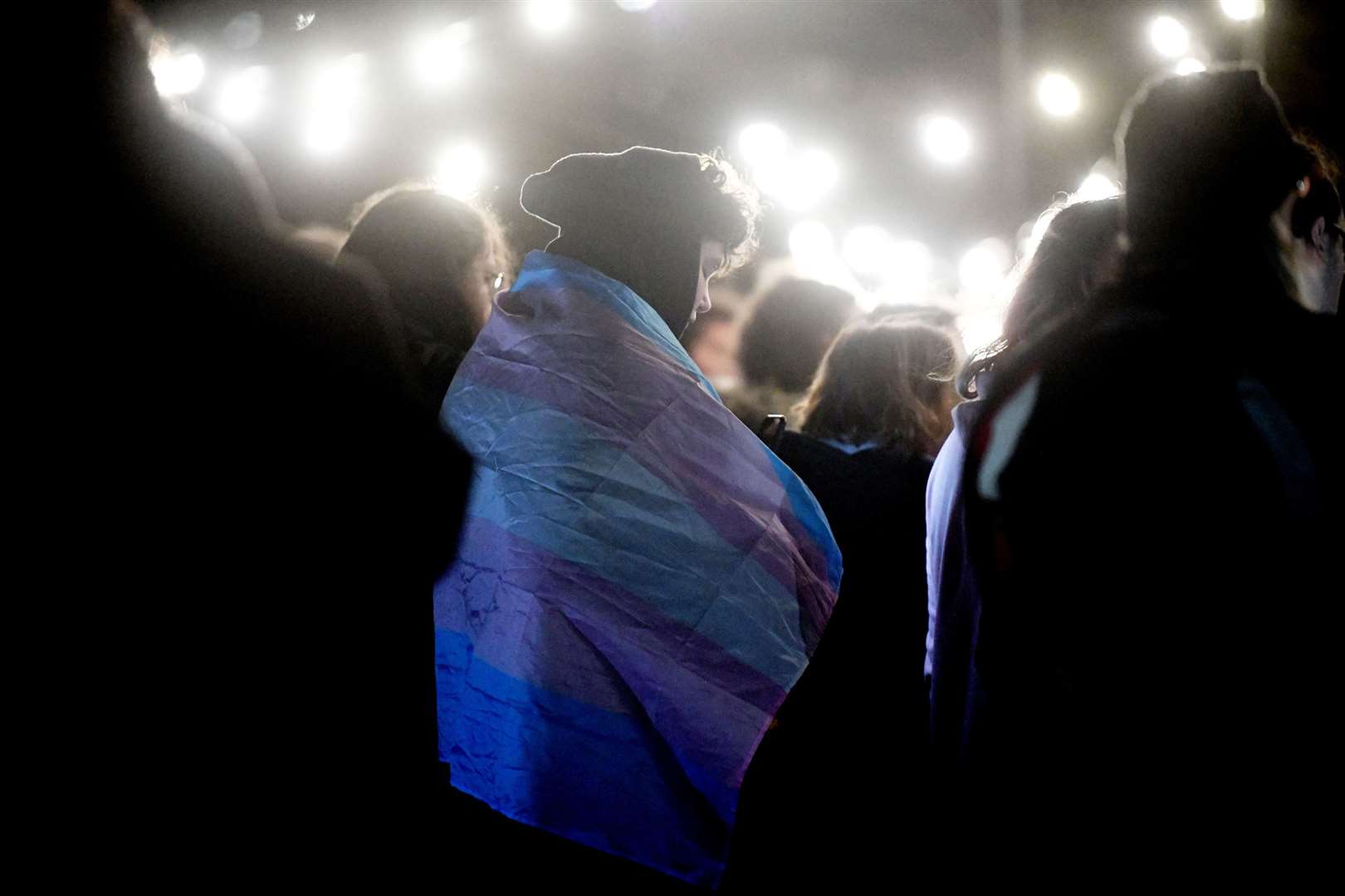 One attendee was draped in the transgender flag. Picture: James Mackenzie