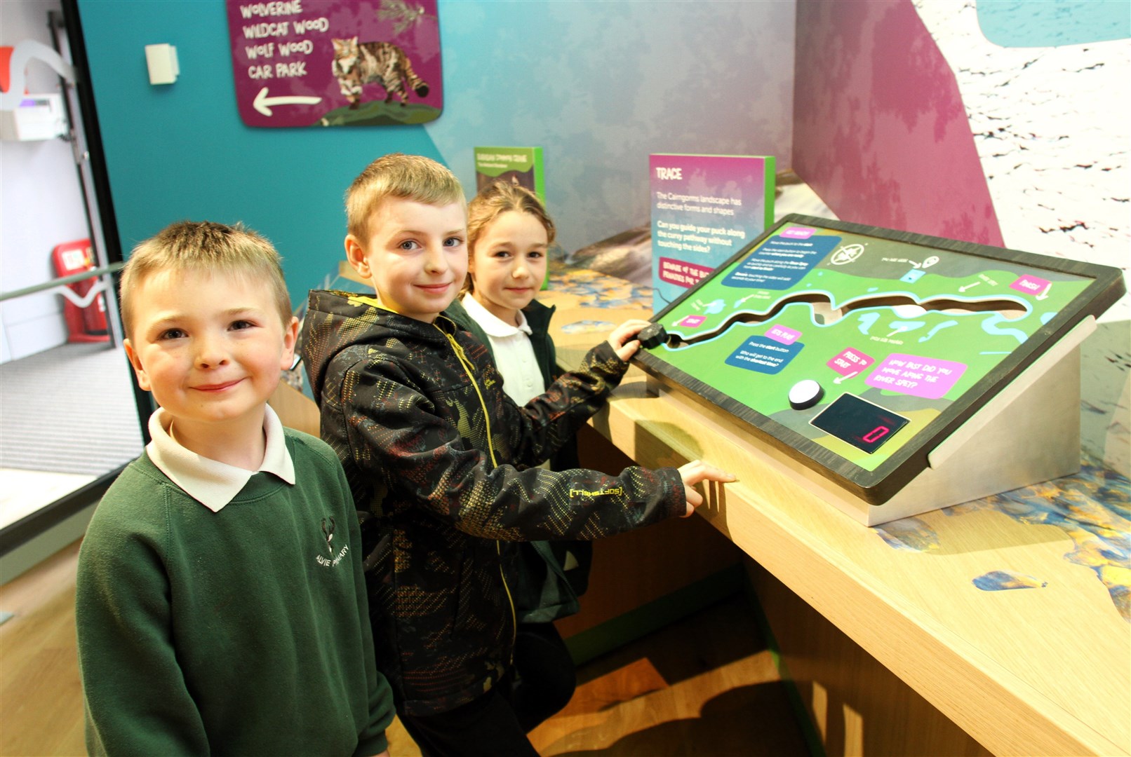 Alvie Primary School pupils Hunter Morris, Mackenzie Morris and Talia Leil having fun on one of the new interactive games in the Discovery Centre.