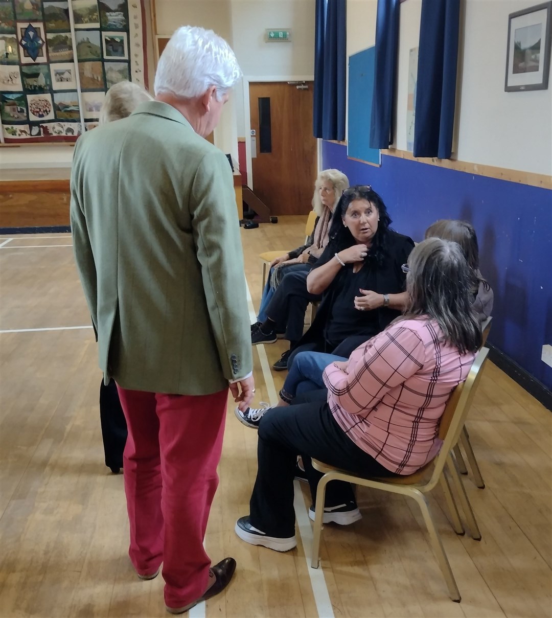 Speyside Distillery's managing director Patricia Dillon discusses the project with some of those who attended the first exhibition recently at Laggan Village Hall