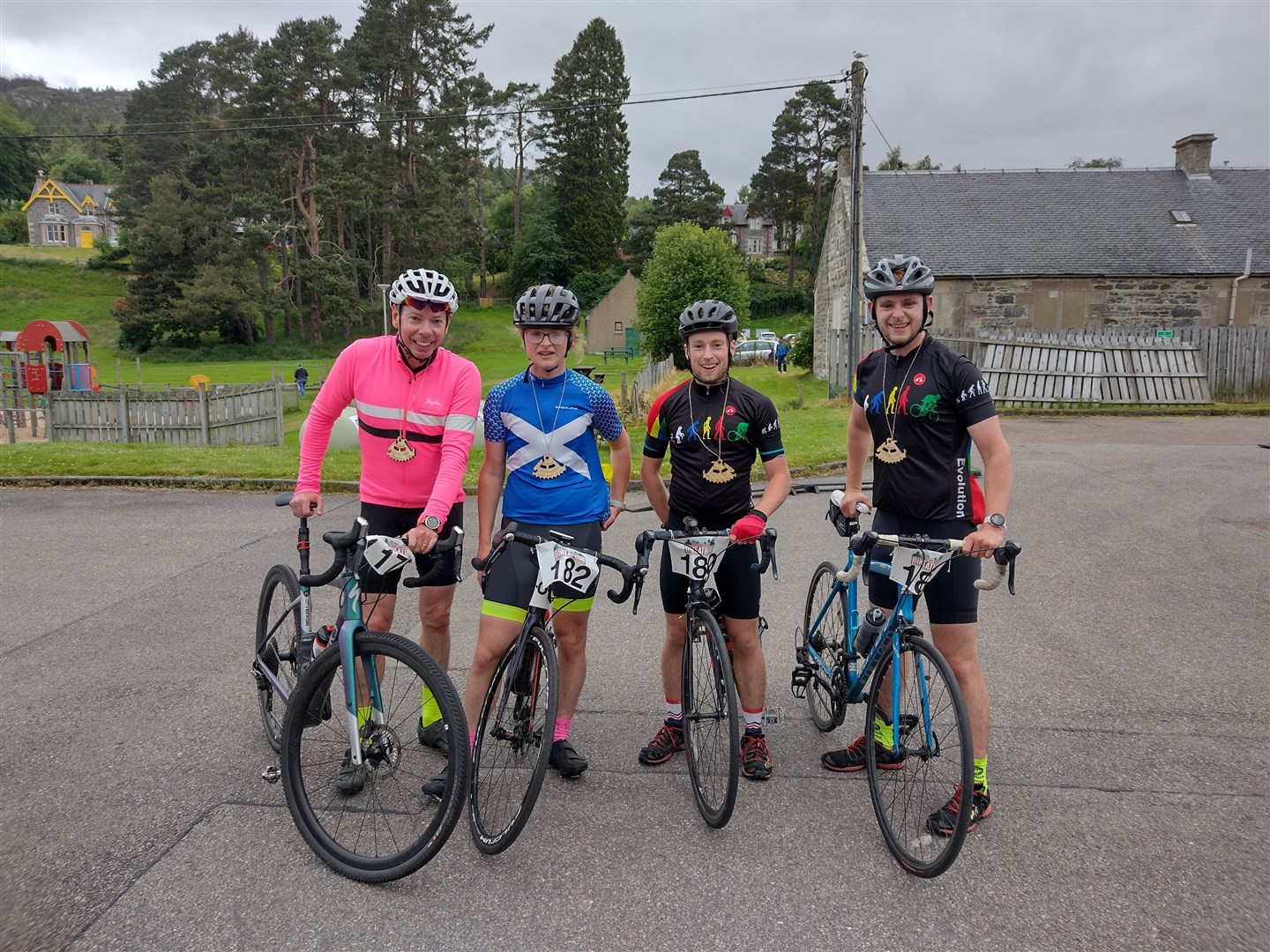 It's a four-way tie at Kingussie Bikeathon 2022. Graham Laybourn of Kingussie (left) matched the young Oliver-Jones brothers Brogar, Ruairidh and Struan from Tain in crossing the finishing line first at the Duke of Gordon Hotel. Picture: Tom Ramage