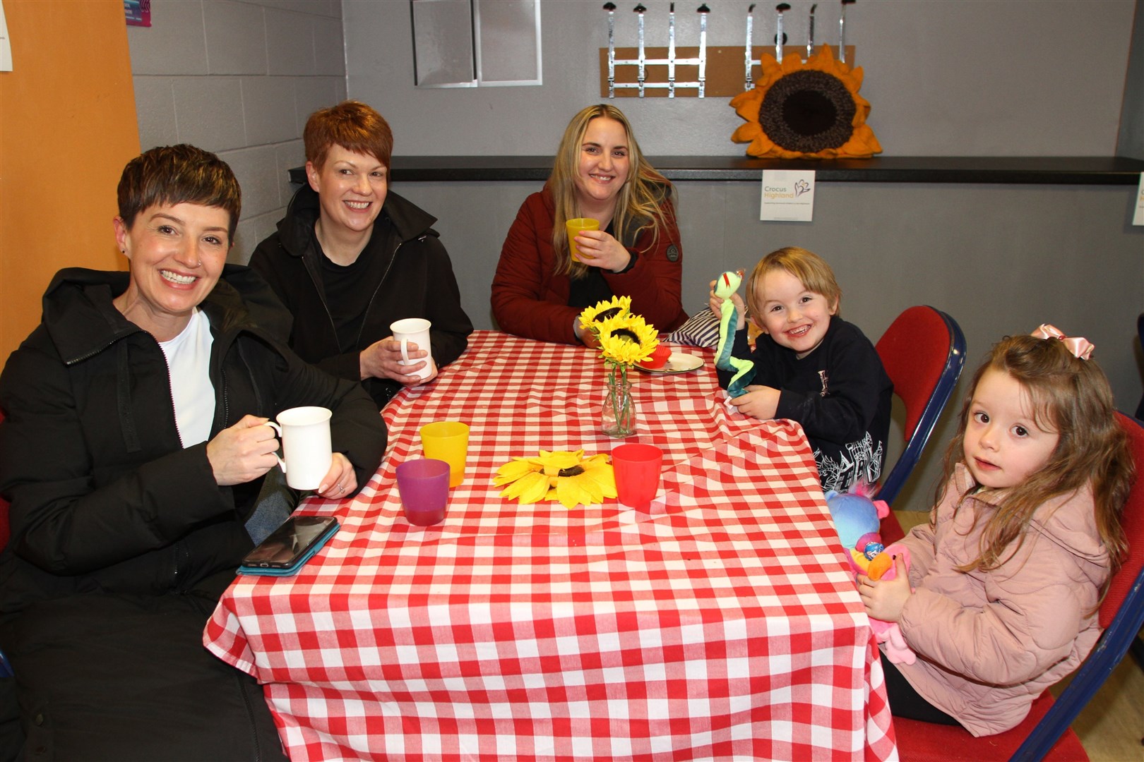 Kerry Alexander with friends and family enjoying a cuppa.