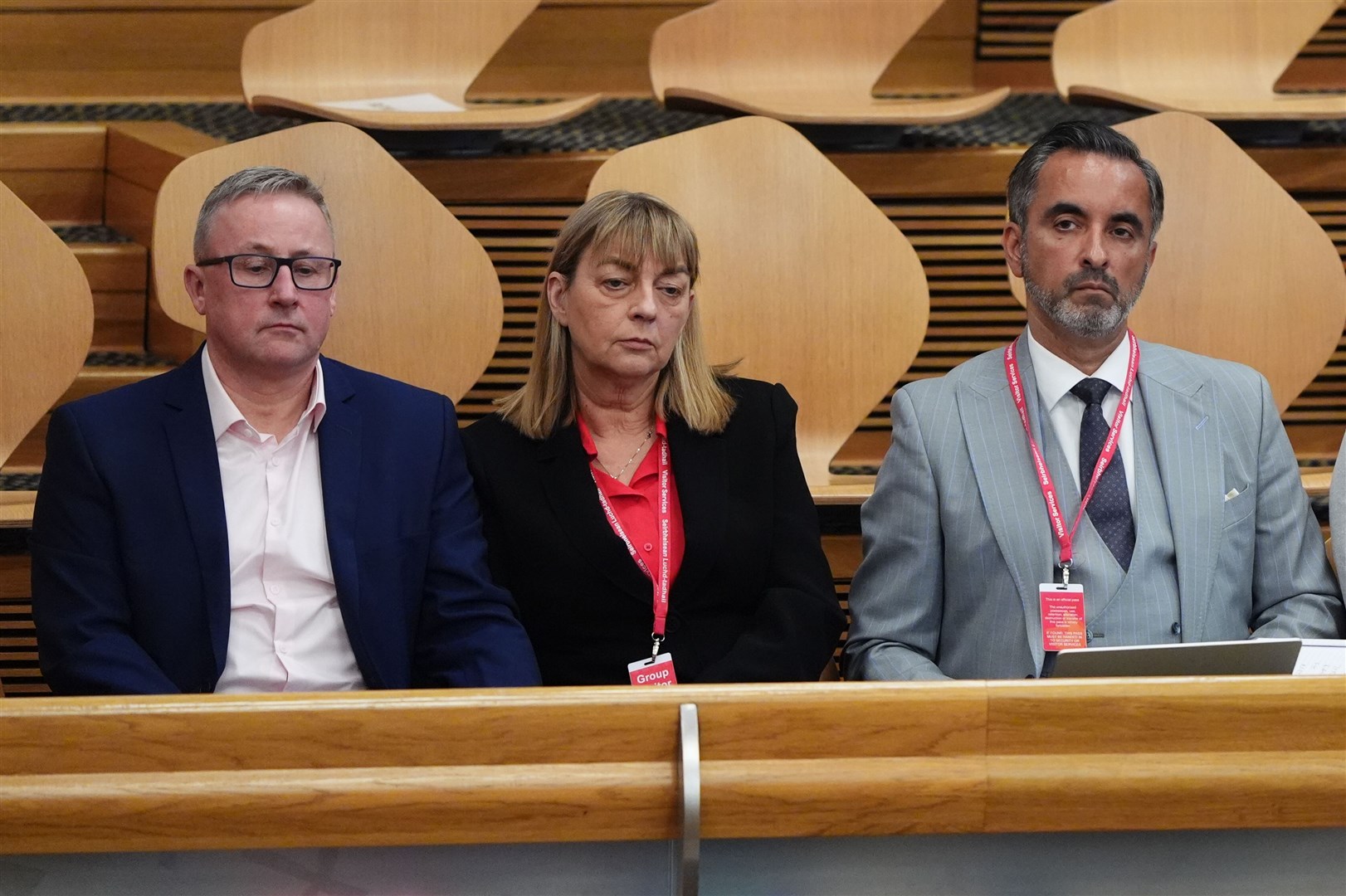 The parents of Katie Allan, Linda and Stuart Allan with lawyer Aamer Anwar (Andrew Milligan/PA)