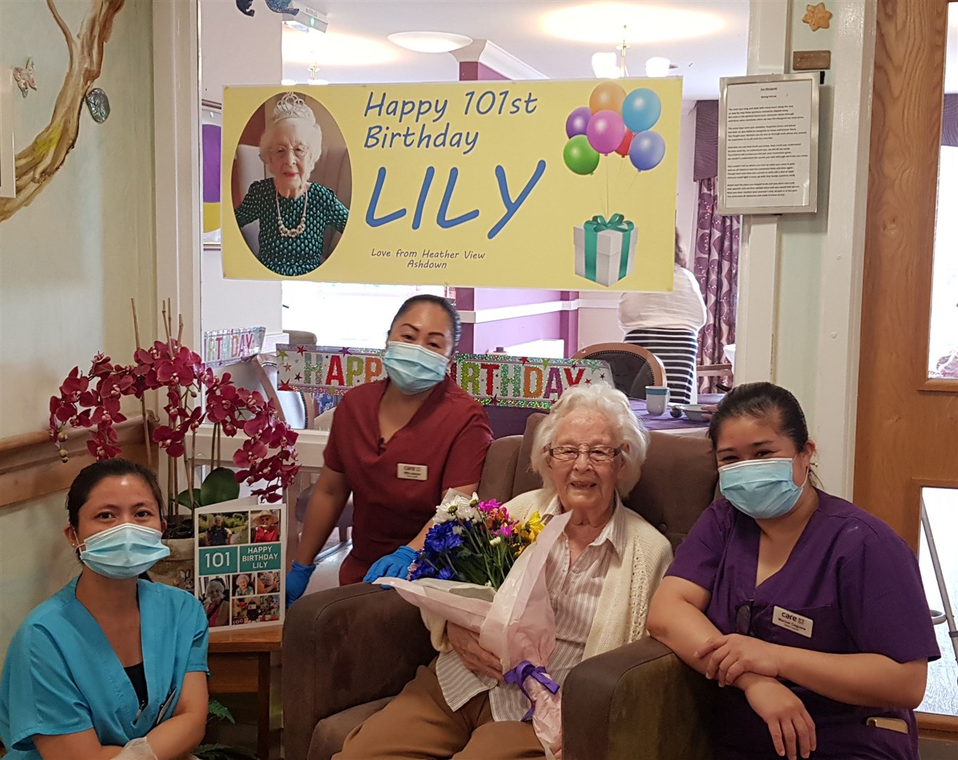 Lily Thornett with care home staff (Care UK/PA)