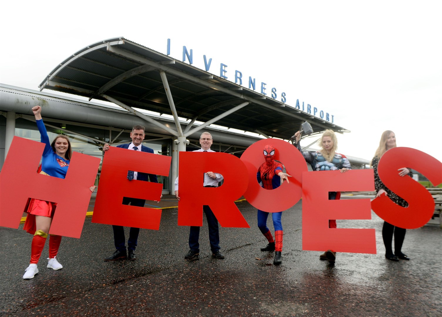 Highland Heroes 2022 launches with help from Graeme Bell, Davie Geddes and Cheryl Campbell from sponsors, Inverness Airport, and some very special friends! Picture: James Mackenzie