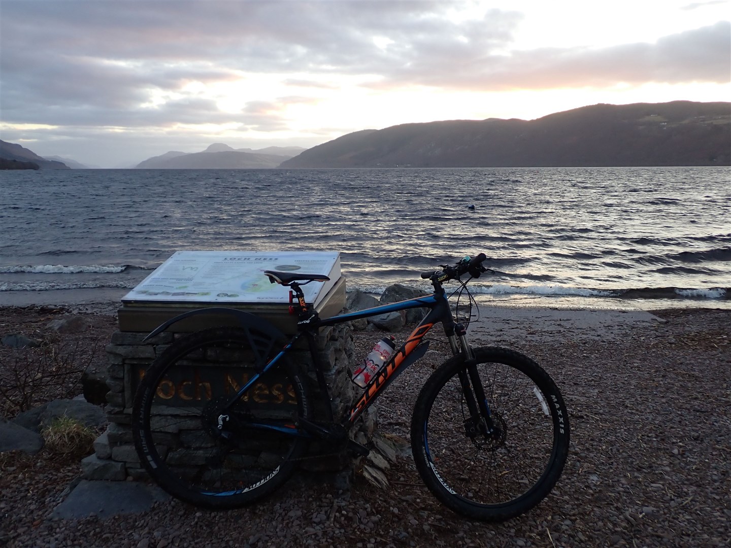 Dores beach overlooking Loch Ness at sunset.