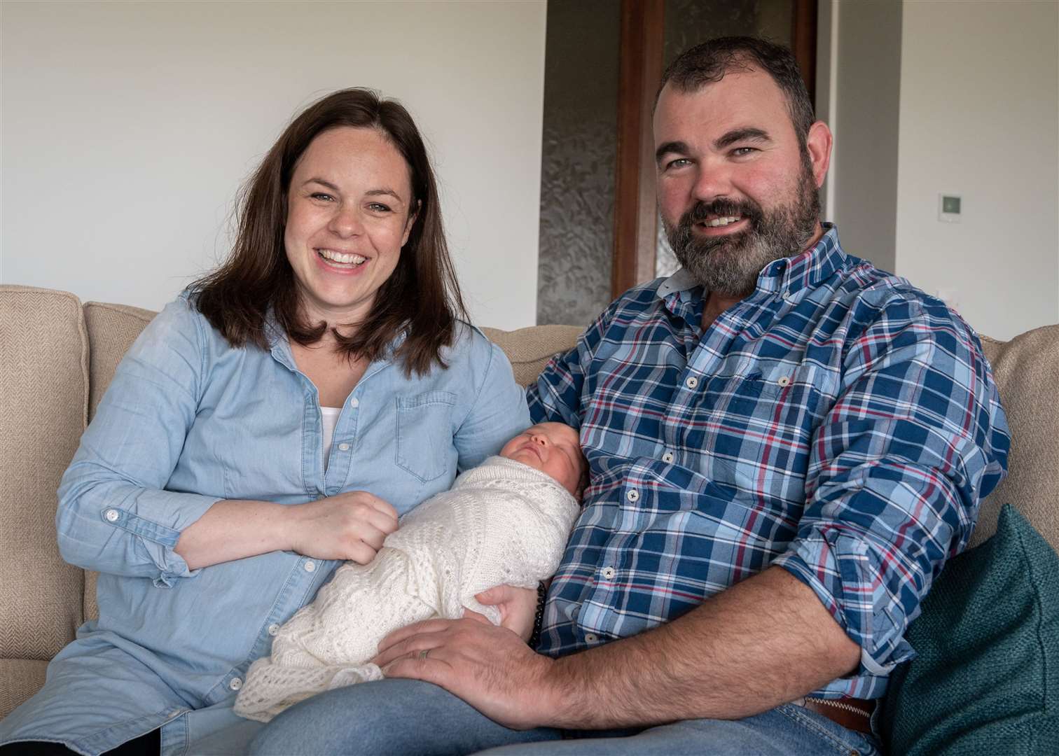 Kate and husband Ali with their new arrival little Naomi. Picture: Ruaraidh White.
