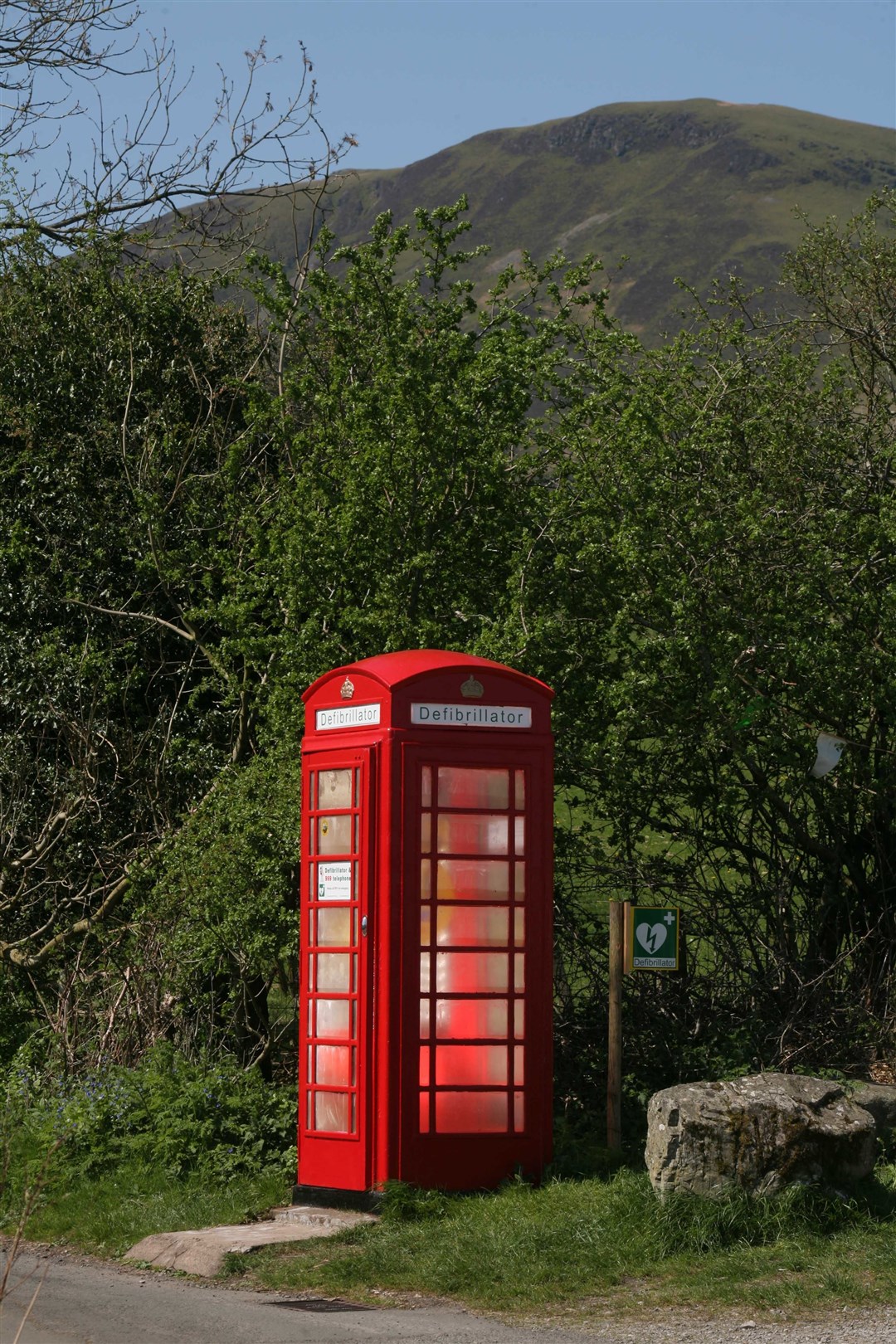 The red phone box in the Cumbrian village of Loweswater in the Lake District is the 3,000th box to be adopted in the UK under BT’s Adopt a Kiosk programme. It has been fitted with defibrillator equipment, which can help save the lives of heart attack victims, paid for by BT and installed by the Community Heartbeat Trust. The phone box was bought by the Trust for just £1 because it was no longer needed as a working payphone.