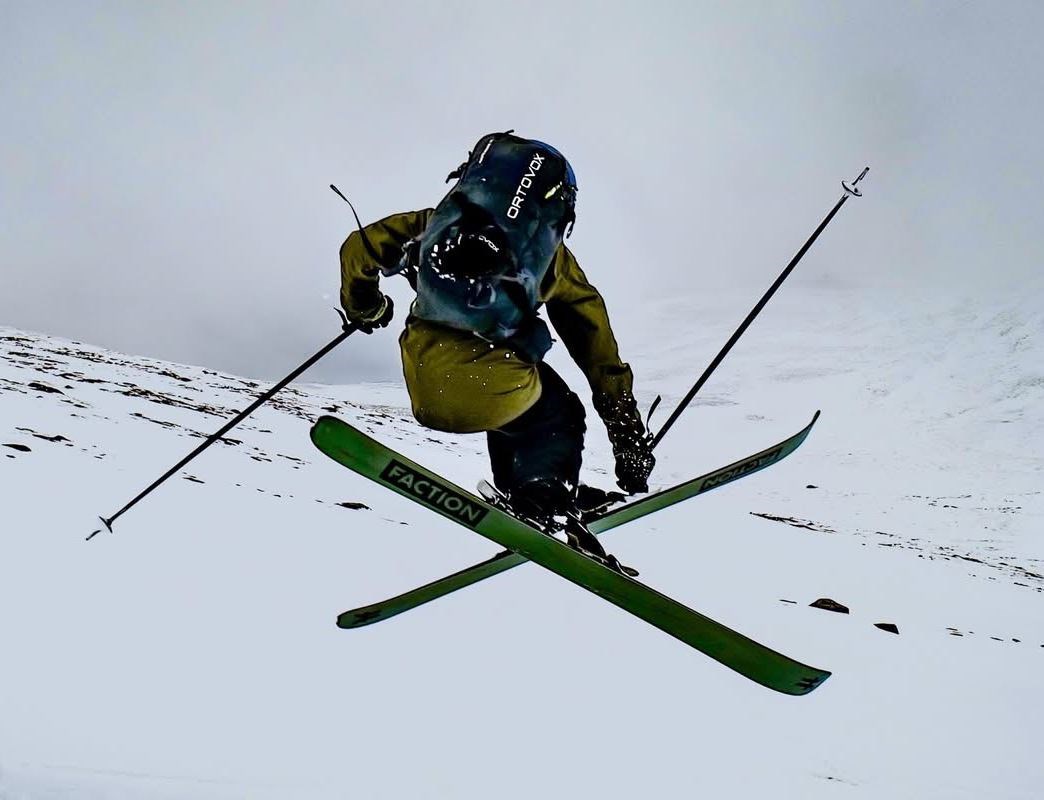 A club member shows off his skills on skis.